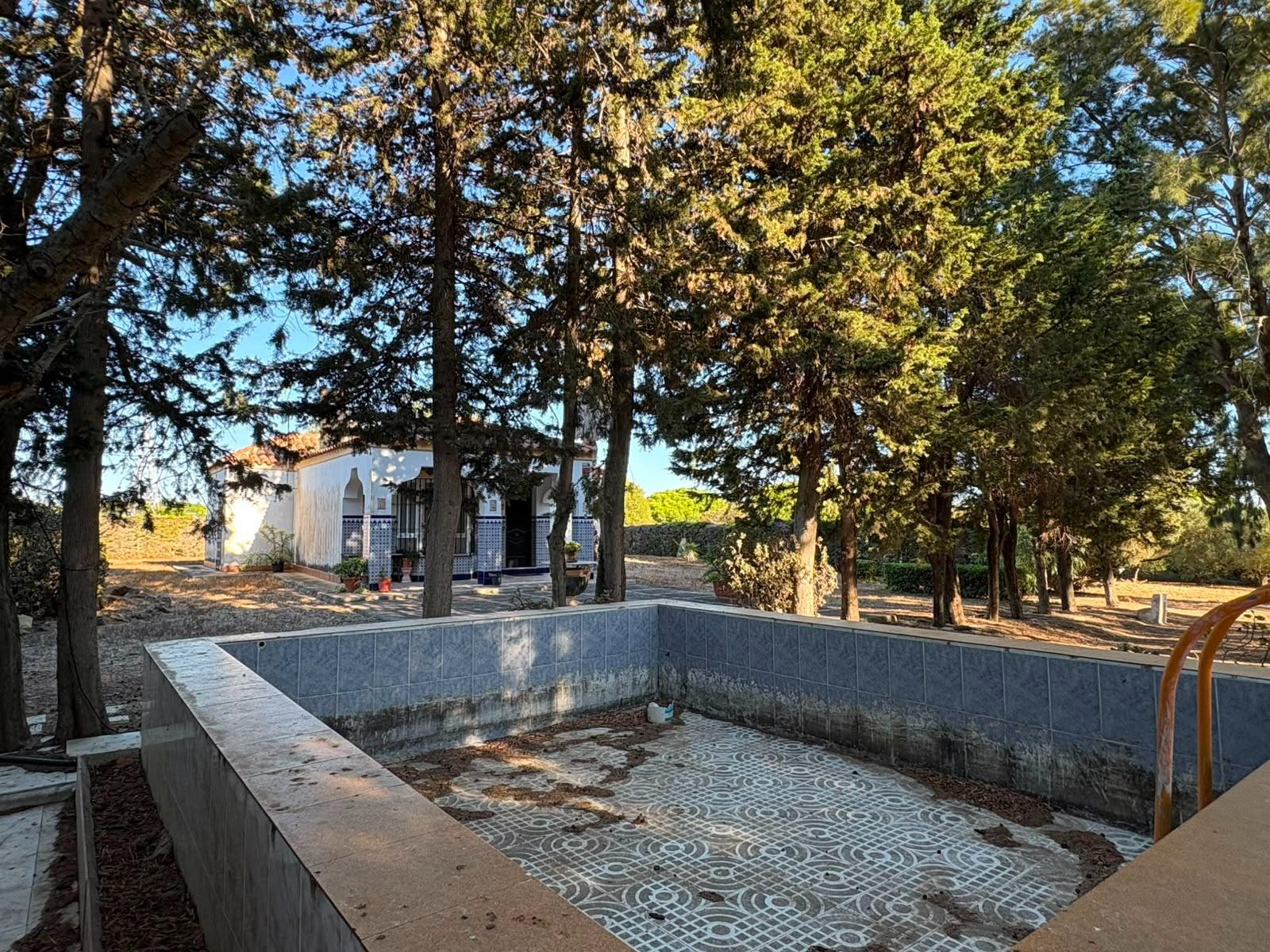 PARCELA RÚSTICA SEGREGADA DE 9.000 M² CON DOS EDIFICACIONES EN EL MARQUESADO, PUERTO REAL