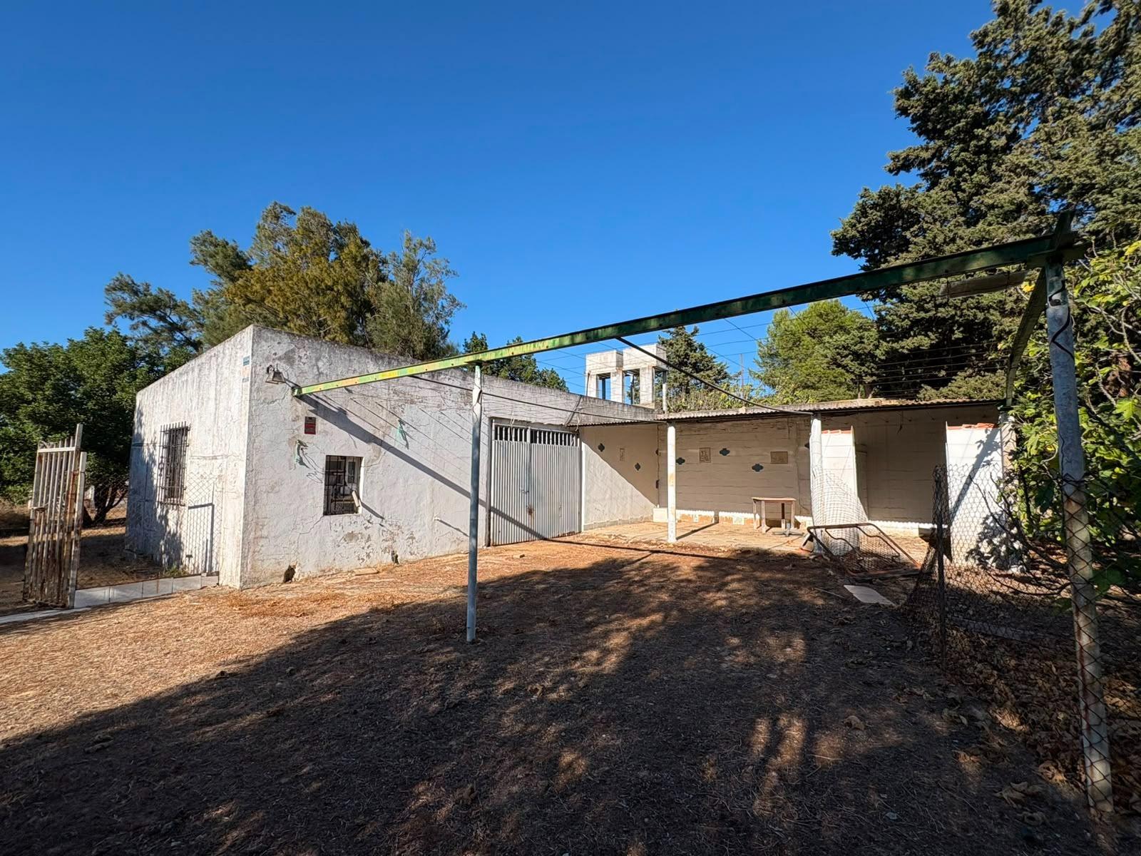PARCELA RÚSTICA SEGREGADA DE 9.000 M² CON DOS EDIFICACIONES EN EL MARQUESADO, PUERTO REAL